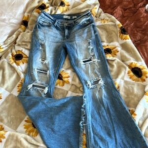 Super-flare distressed jeans